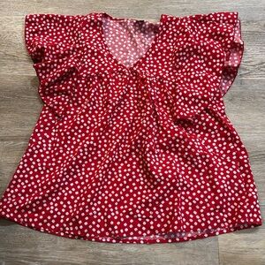 Women’s red and white blouse